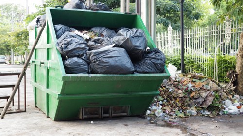 Workers segregating construction waste on-site